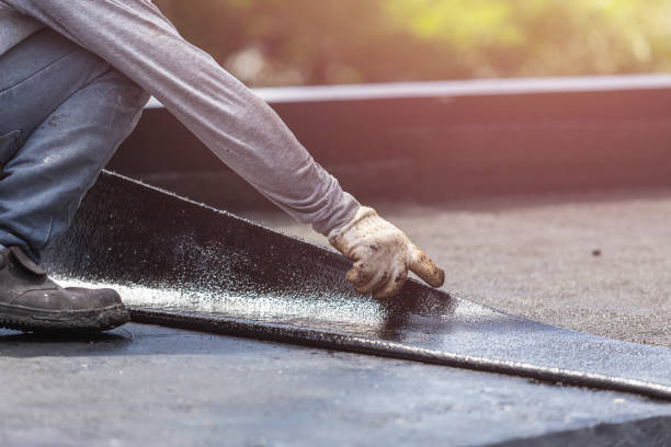 Professional Waterproofing technician working in Coleman, MI